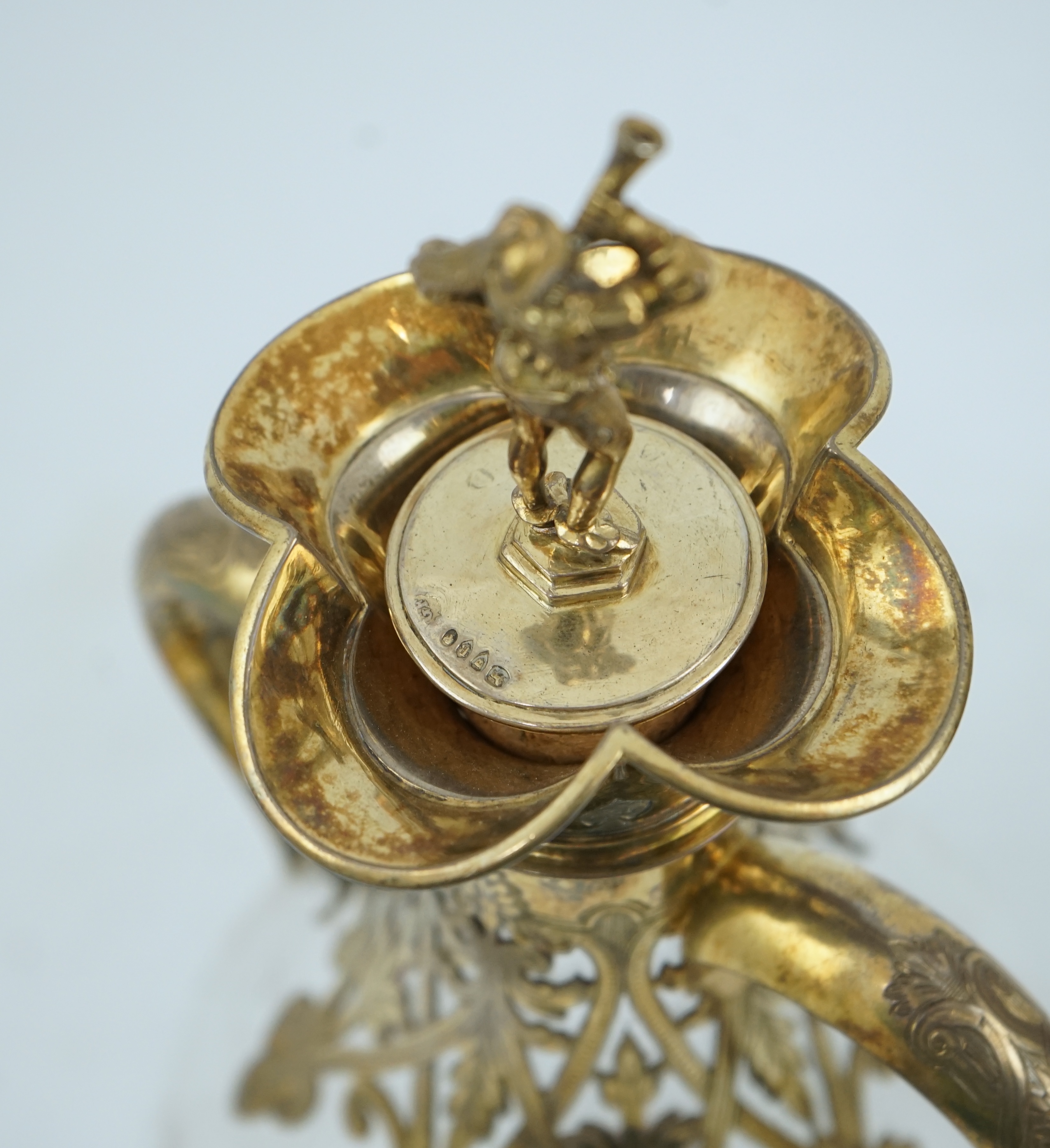 A good pair of Victorian silver gilt mounted wheel engraved glass two handled decanters and stoppers, by George Fox